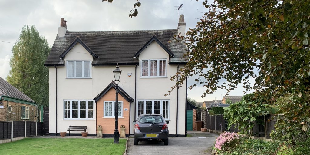 A house with timber replacement windows.